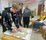 В Котласе прошли соревнования по скоростной сборке спилс-карт «Моя Архангельская область».